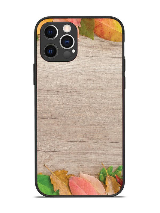 iPhone 12 Pro Autumn Leafs On Wooden Table