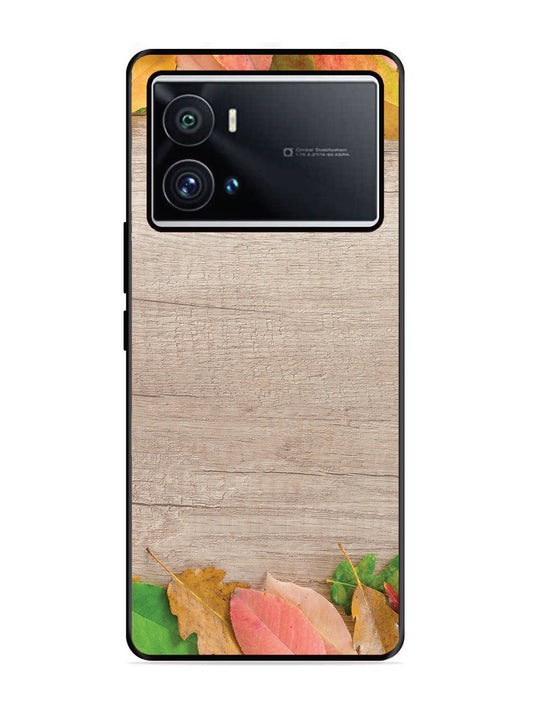 iQoo 9 Pro Autumn Leafs On Wooden Table
